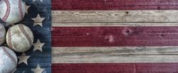 Baseballs on vintage USA wooden flag for sports concept