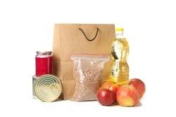 Paper bag and food isolated on plain background. Food donations, delivery