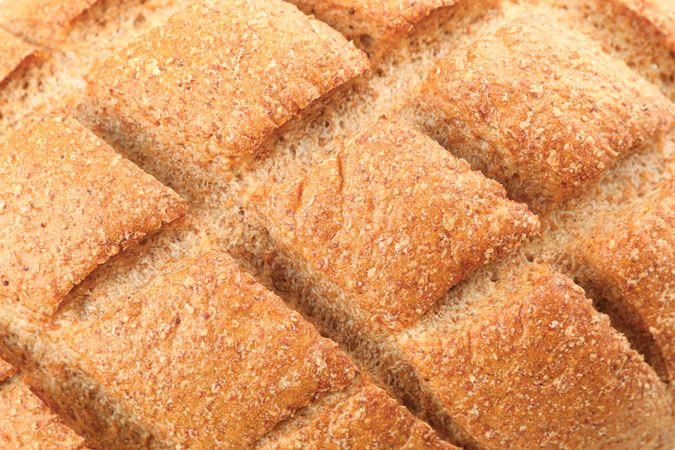 Wheat bread as background, closeup. Bakery products