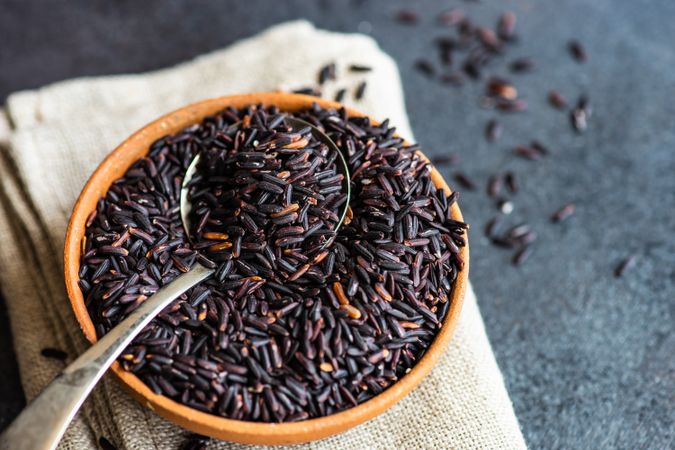 Organic dark rice in bowl