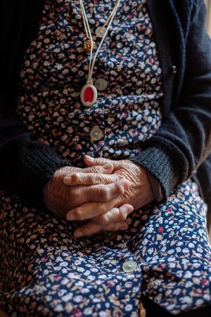 Detail of hands of an older woman