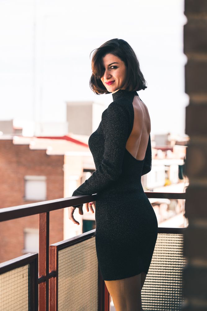 elegant woman on balcony