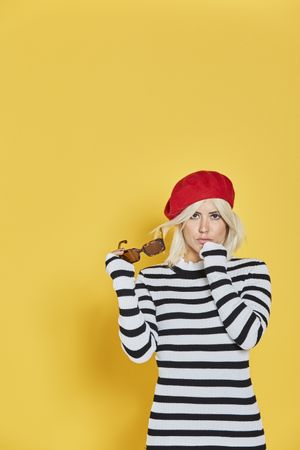 Happy young female in red beret