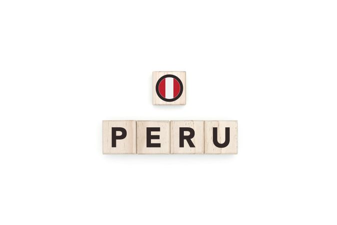 Wooden blocks bearing the name and flag of Peru.