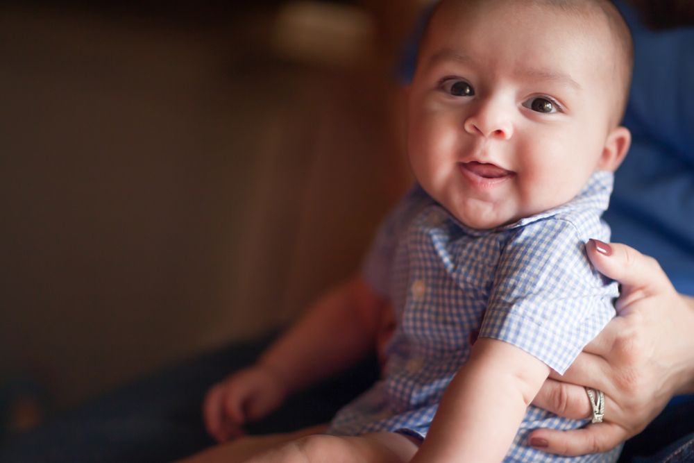 Cute Infant Having Fun with His Parents.