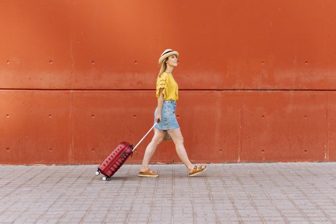 Young woman traveler going on holiday
