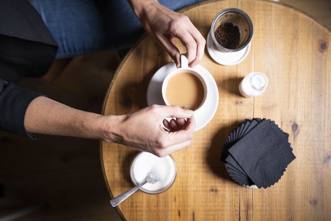 Woman with tea cup in cafe