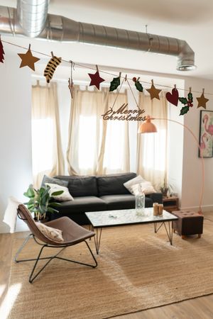 Light modern room decorated for Christmas