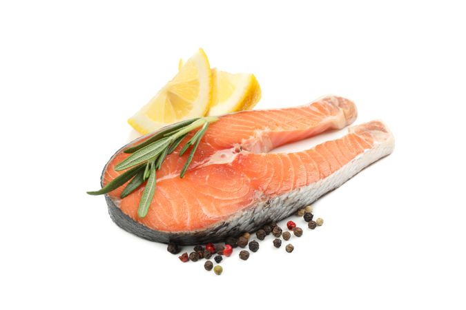 Fresh raw salmon meat and spices isolated on plain background