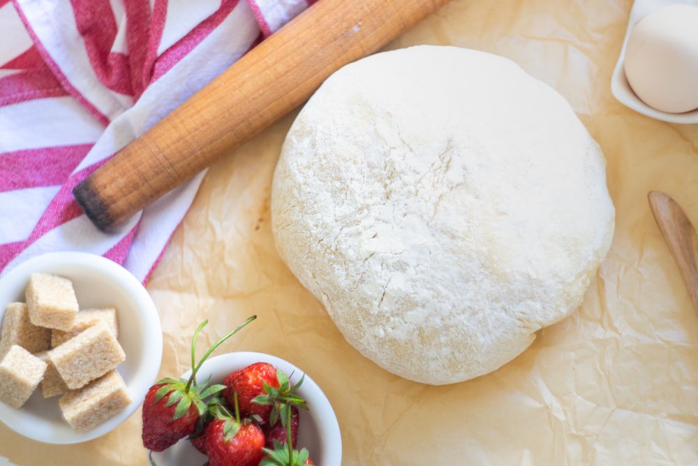 Traditional Ukrainian dumpling dough being prepped
