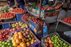 Boxes and baskets of fruits and vegetables at the market