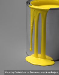Yellow paint dripping from a metal tin can 5ok9G5