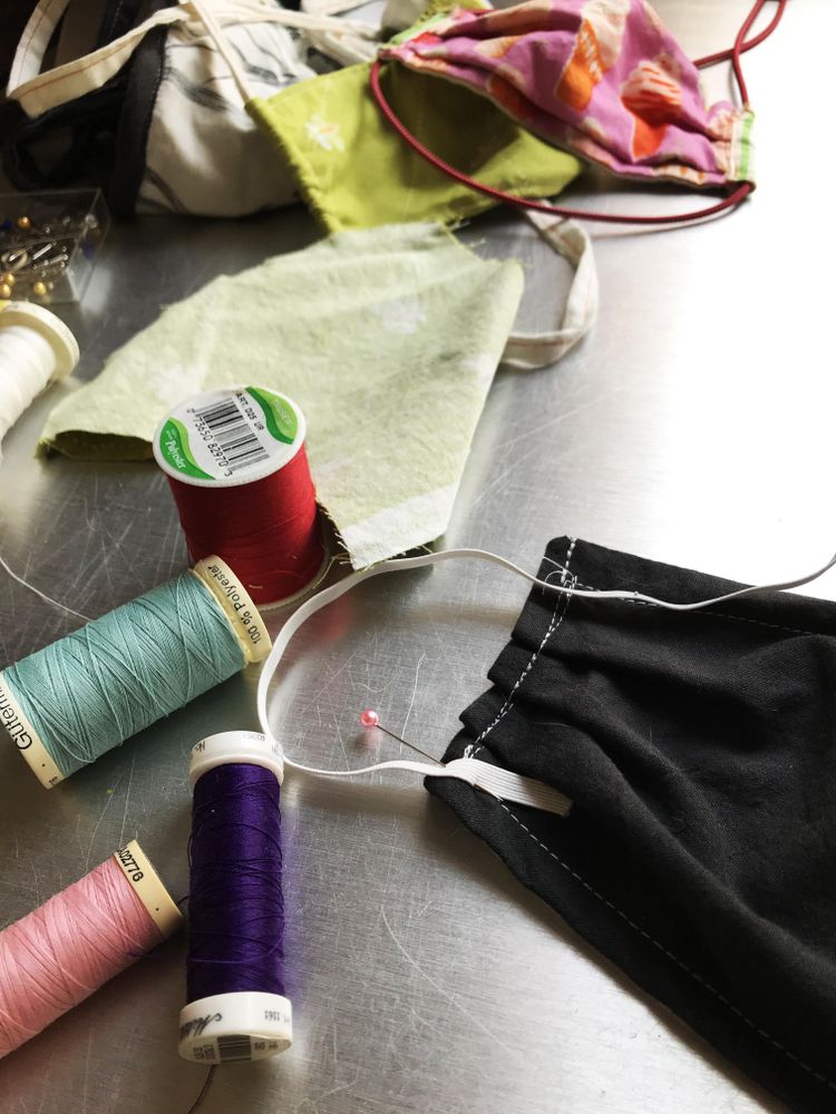 Close-up of homemade face mask sewing thread and fabric