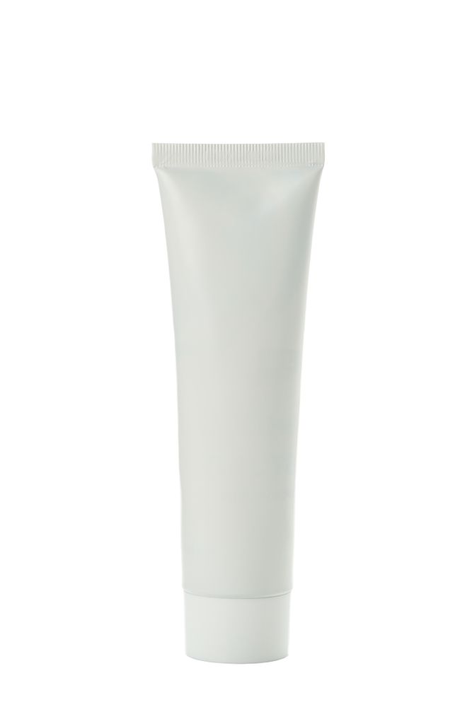 blank tube isolated on light background
