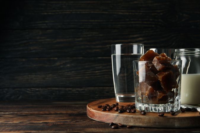 Composition of prepare ice coffee on wooden background