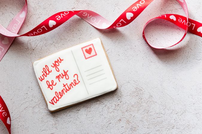 Valentine's Day- Red ribbon with love message. Concept. Flat Lay