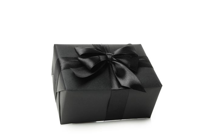 dark gift box isolated on light background