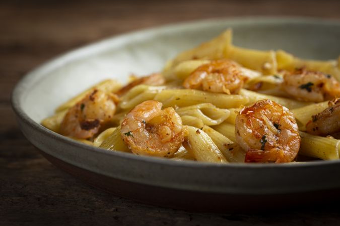 Penne pasta with grilled shrimp.