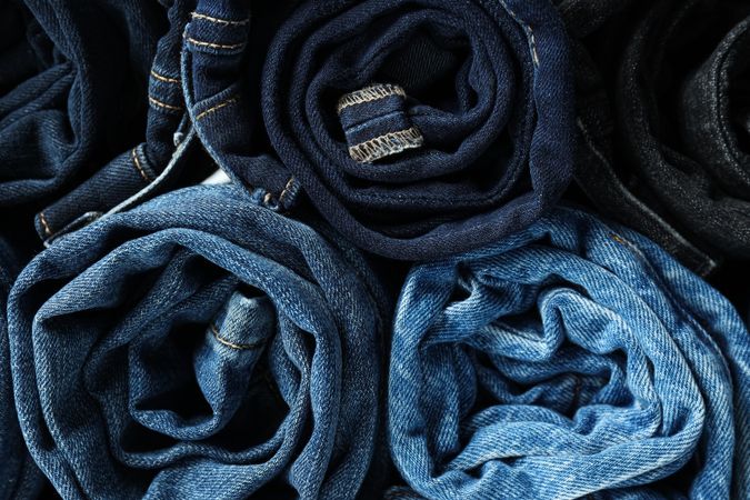 Concept of modern casual clothes - jeans, rolled jeans