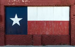 Texas flag, painted on boarded-up window in Brownwood, Texas v5qgYb