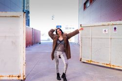 Excited female on city street