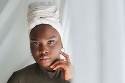 Serious Black woman in turban