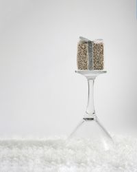 New year and holidays concept of cocktail glass and small decoration