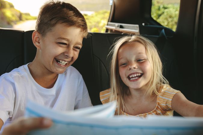 Kids traveling in a car