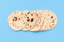 Homemade flatbread on a blue table