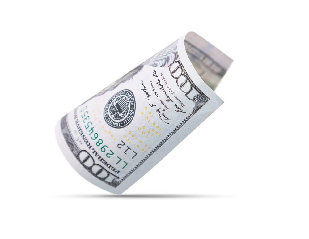 One Hundred Dollar Bill Floating Down To Surface with Drop Shadow