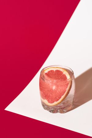 Close up of tonic water with grapefruit slice