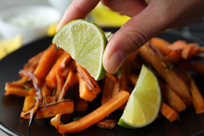 Concept of tasty food, fried sweet potato, close up