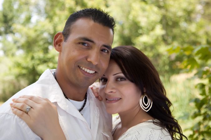 Attractive Hispanic Couple in the Park