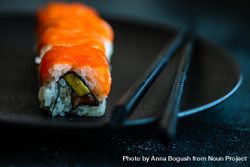 Salmon sushi rolls served on stone slate 4jVgev