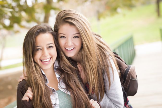 Women Pose for a Portrait Outside