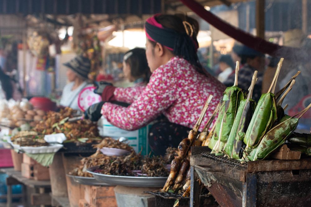 Women at their kiosk at the street food market