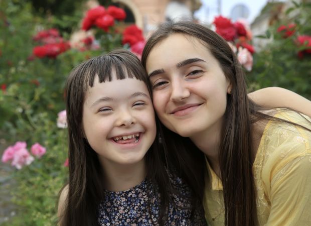 Portrait of two loving sisters