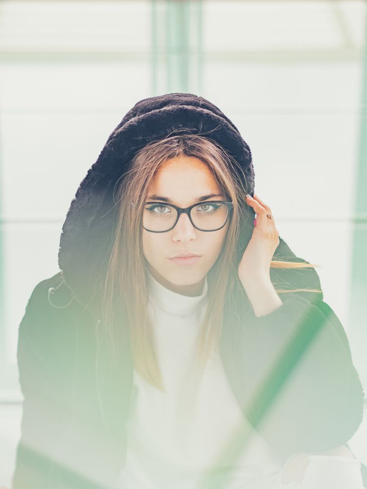 Young woman over a glasses ground