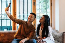 Asian man and Black Latina woman on a date