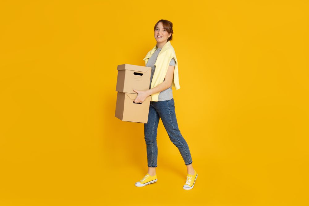 Concept of move with young woman on yellow background