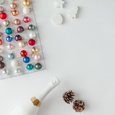 Bauble decorations ordered in box with bottle of Champagne