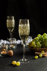 Glasses with wine and grapes