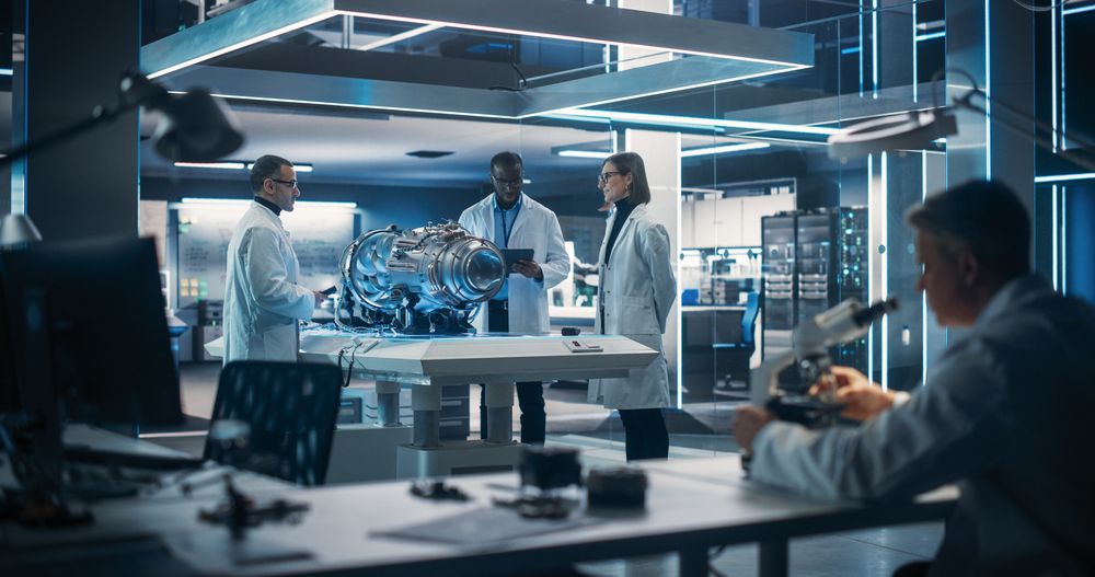 Thrust Engine Engineer, Project Manager and Machinery Operator Work on a Futuristic Turbine Motor