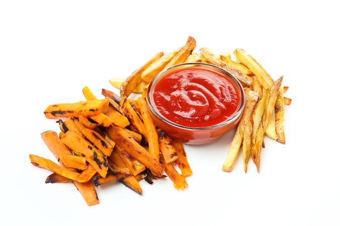 Concept of tasty food - sweet potato fries, isolated on light background