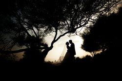 Marriage of woman and man embracing in darkness
