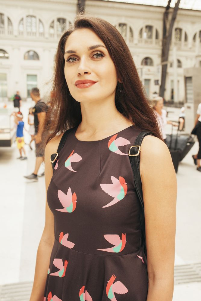 Woman standing at train station