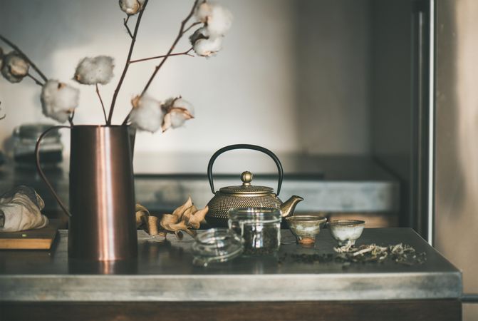 Traditional Japanese tea set, on kitchen counter, with dried cotton