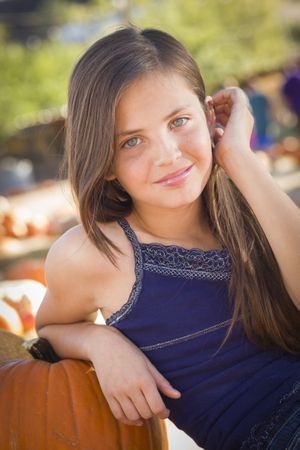 Teen Girl Portrait at the Pumpkin Patch