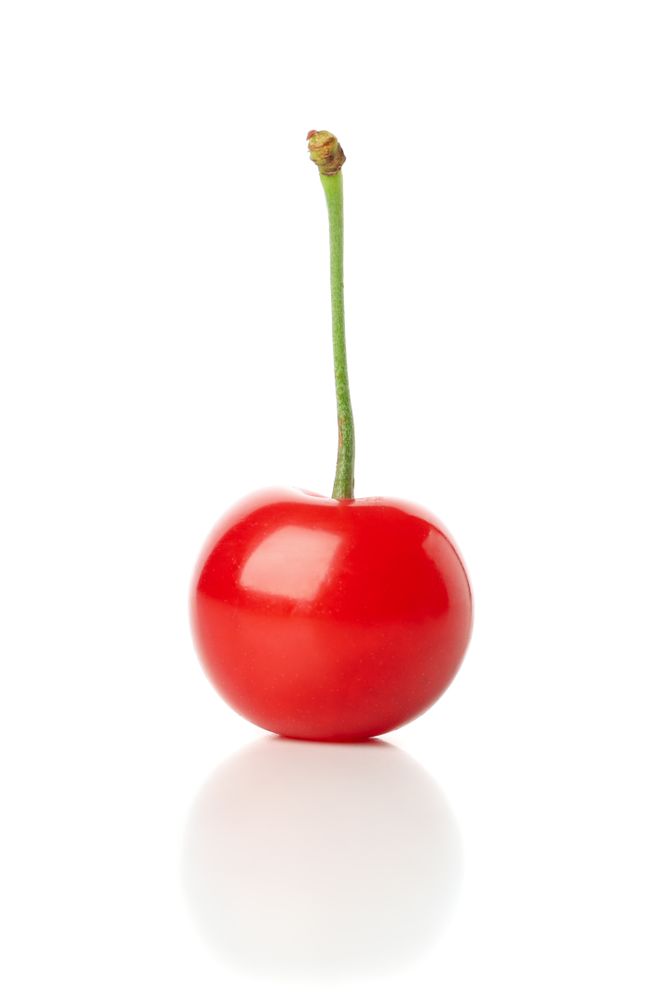Fresh red cherry isolated on neutral background