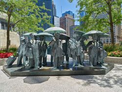 Artist Ju Ming’s Gentlemen statue grouping in downtown Chicago e5zBP5